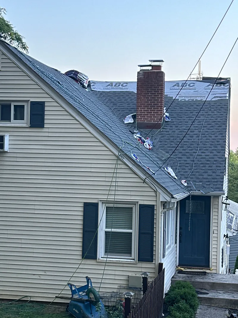 Cape Cod home — roof replacement in progress
