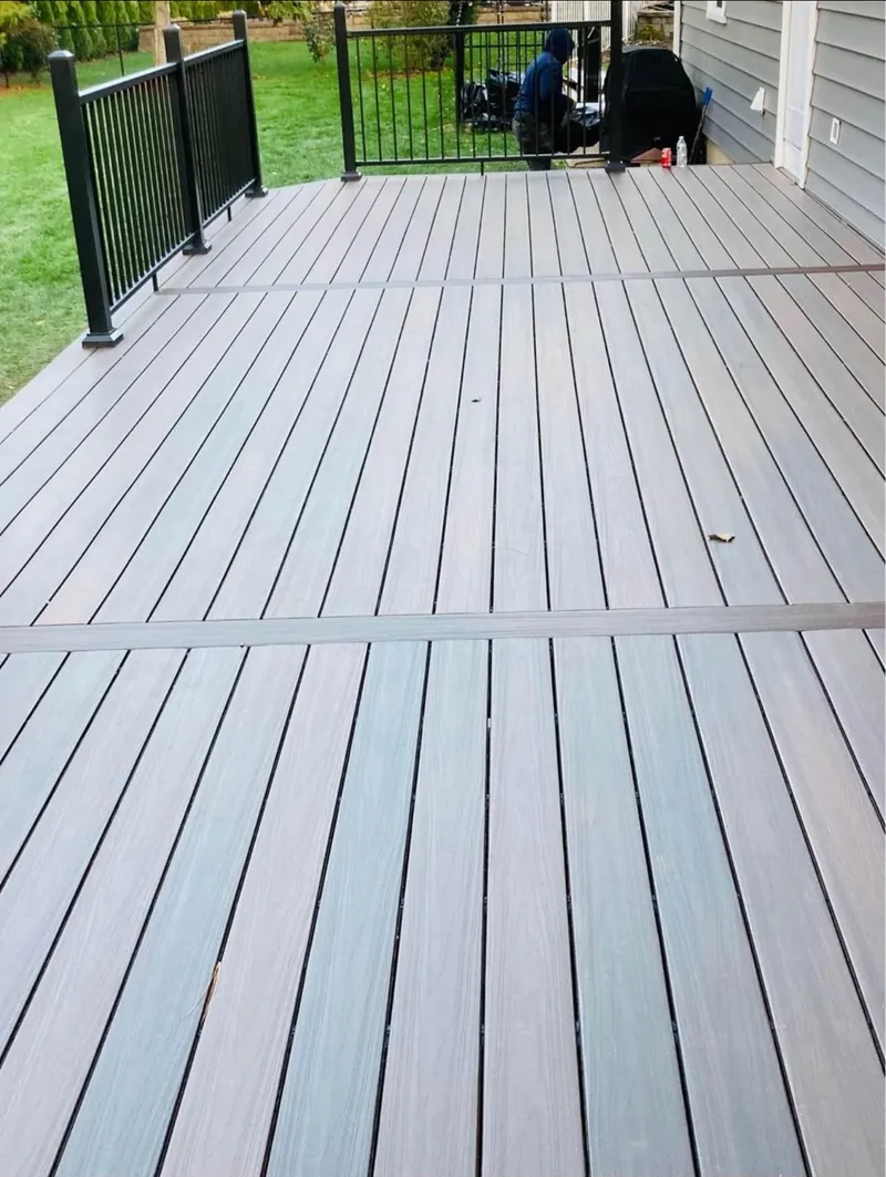 Composite deck with black aluminum railing