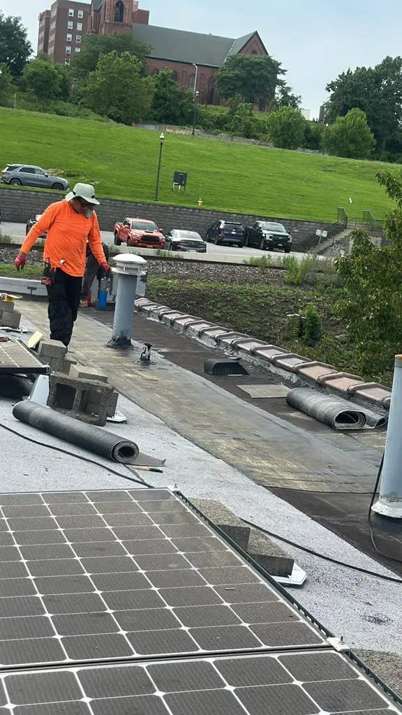 Commercial flat roof — crew at work