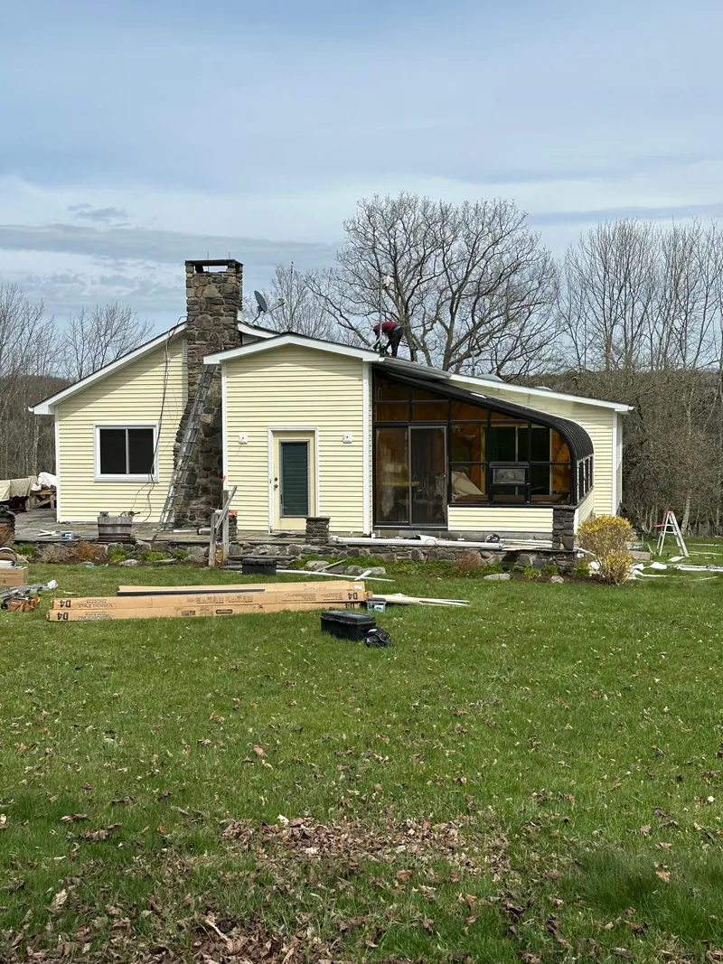 Home renovation with stone chimney