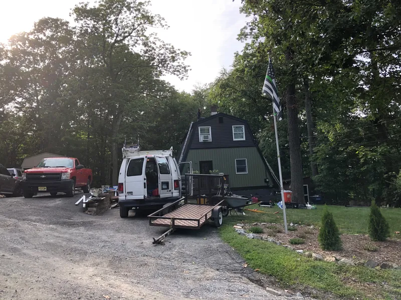 EMA crew and trucks on the job site