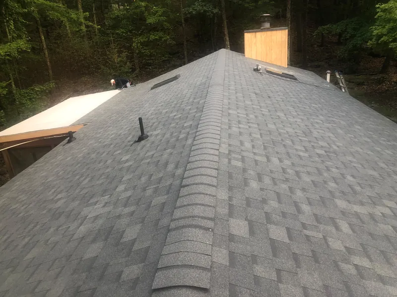 New architectural shingle roof with ridge cap